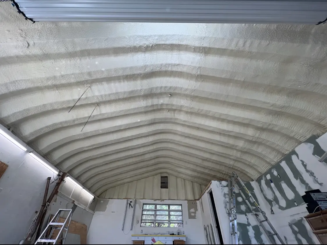Spray polyurethane foam applied to the underside of a metal roof deck in Mapleton